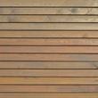 Drewno elewacyjne modrzew syberyjski na scianie budynku - JAW Konin