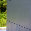 Panel elewacyjny cembrit na ścianie budynku - JAw Konin