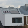 Solary  Roto i okna dachowe na dachu typu rąbek stojący