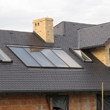 Okna dachowe i solary Roto na jednym dachu