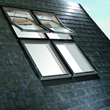 Okna dachowe z pcv Roto R4 połączone w pionie i poziomie z oknami RotoTronic